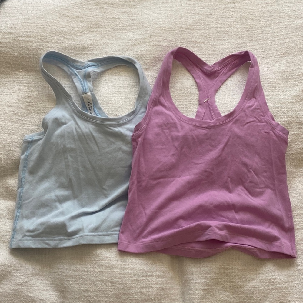 Lululemon razor back cropped tank tops in a pastel blue and purple